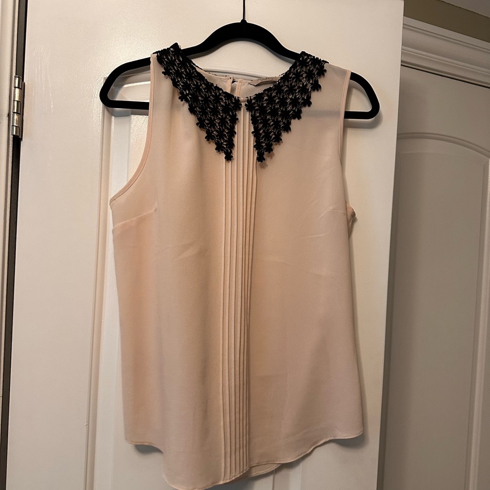 Adorable light pink with black lace detail. Brand is Darling, Size Medium